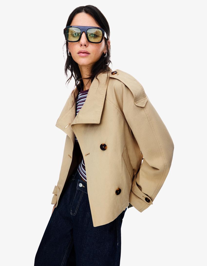 Calvéra – Belted design – Cropped trench jacket