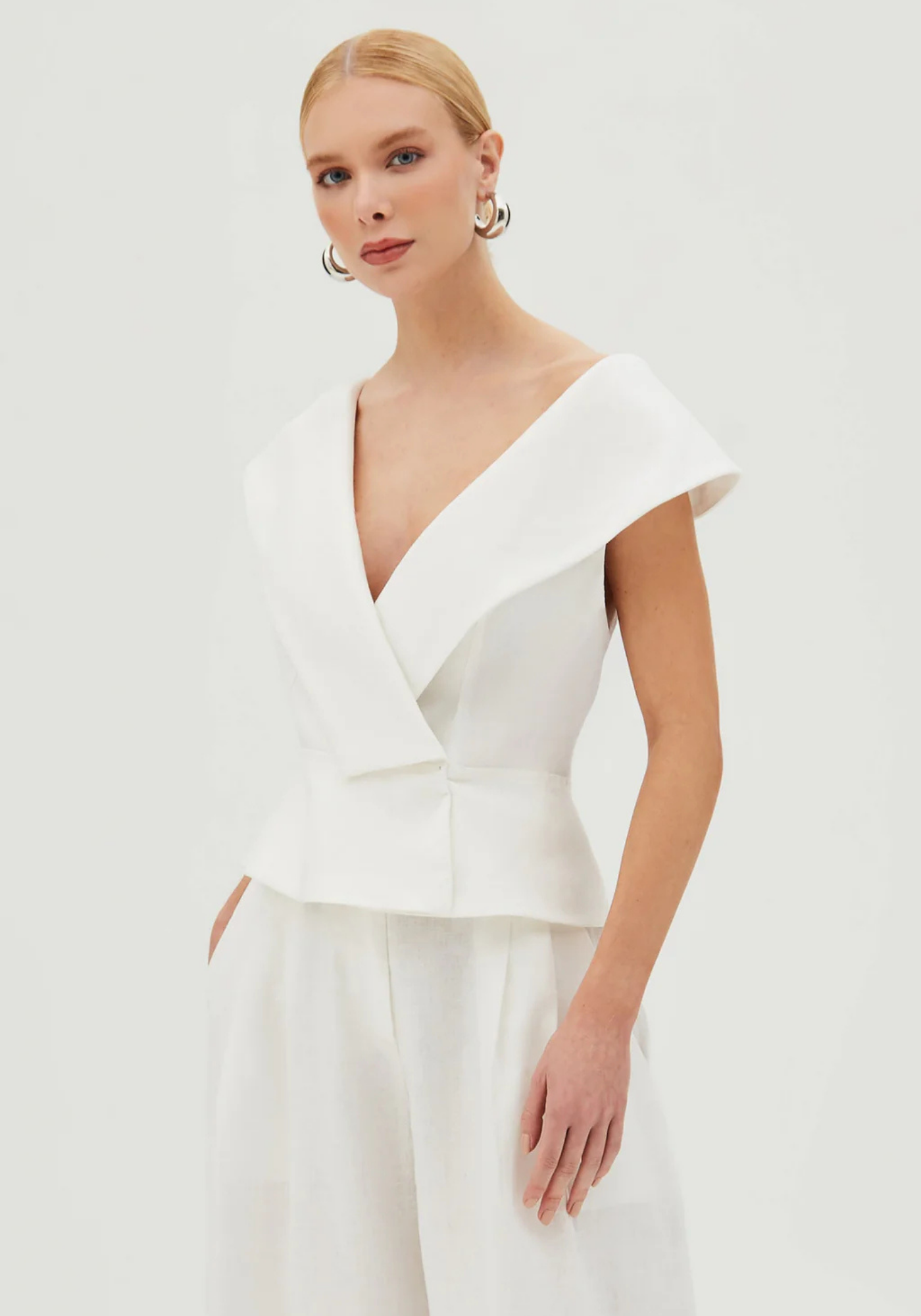 Paloma – Structured peplum top – Wide-leg trousers set