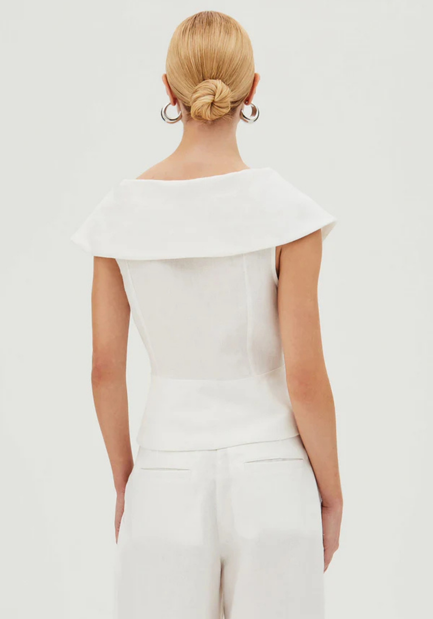 Paloma – Structured peplum top – Wide-leg trousers set