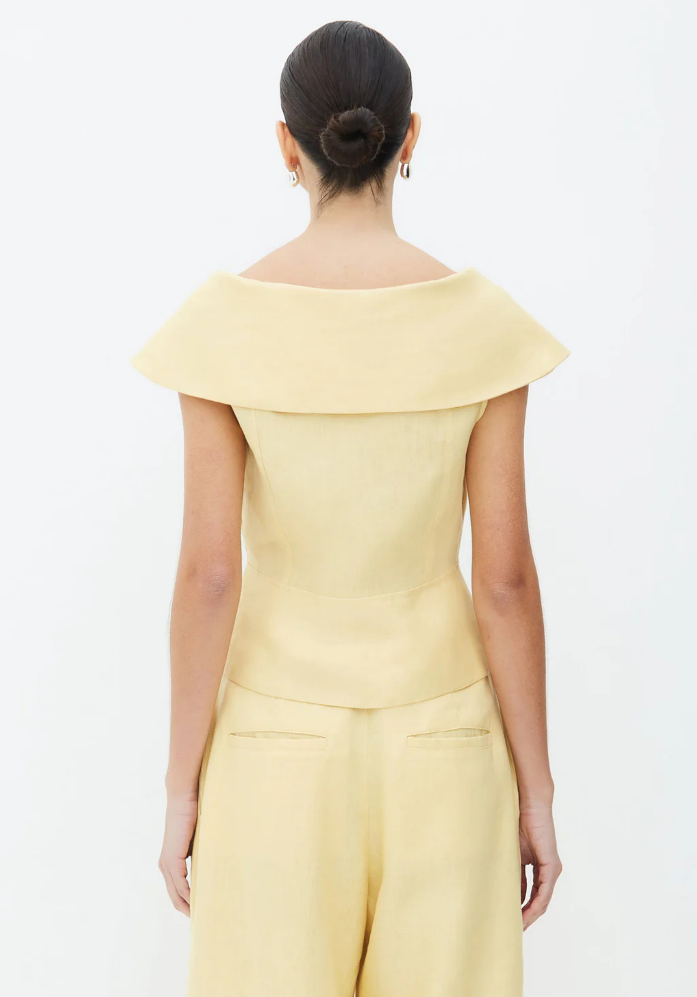 Paloma – Structured peplum top – Wide-leg trousers set