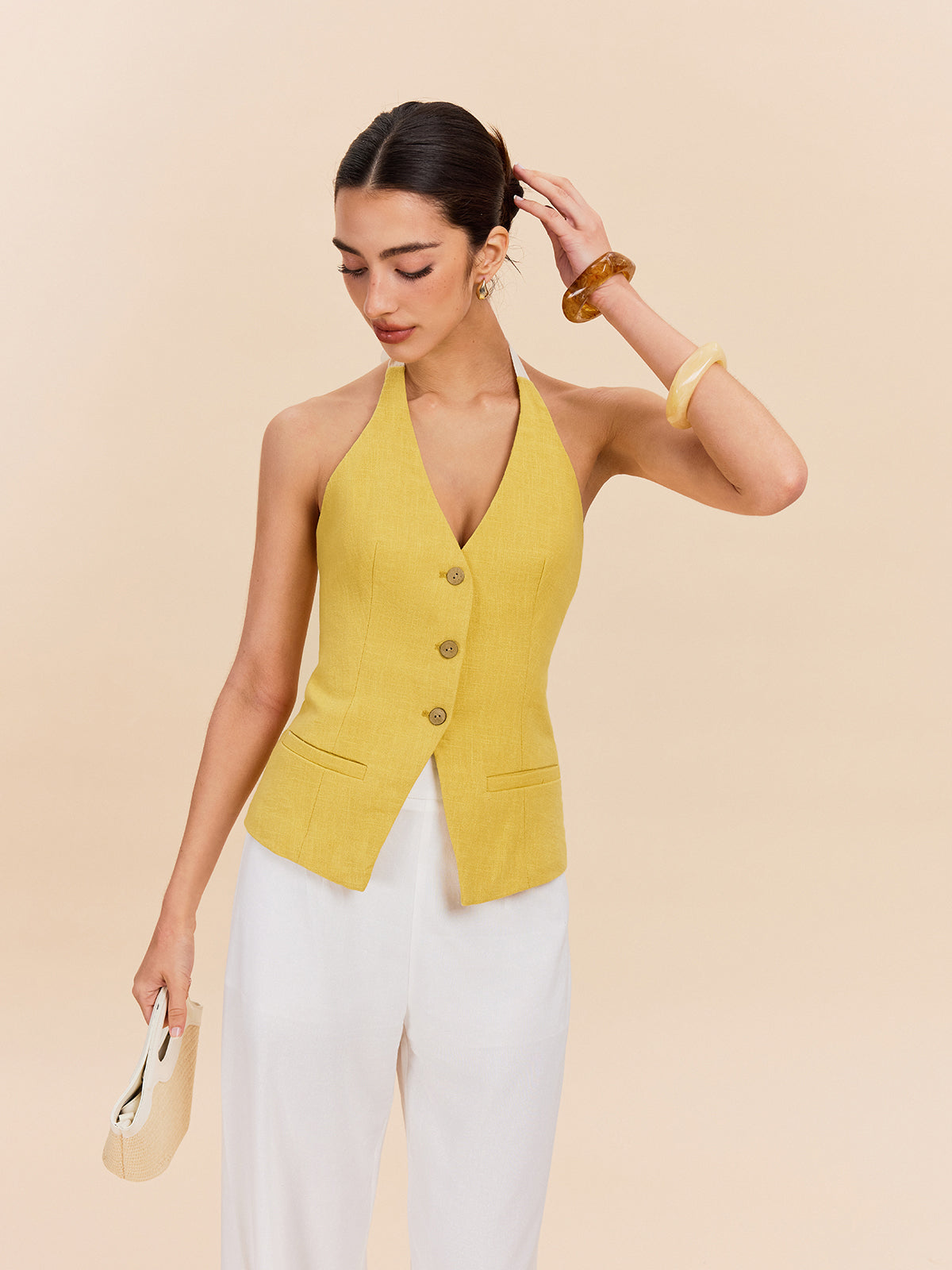 Solandra – Tailored ease – Halterneck waistcoat top